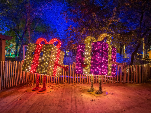 VERLEIH: LED 3D-Figur "Fröhliches Geschenkspaket W" | Pink mit goldener Schleife | HxBxT: 230x220x110cm | 230V/24V | 44W | warmweiß | inkl. Netzteil | IP44