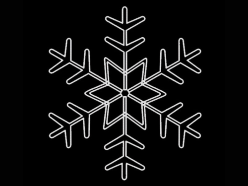 Schneekristall – klein – strahlt in weihnachtlichem eisweißen Licht